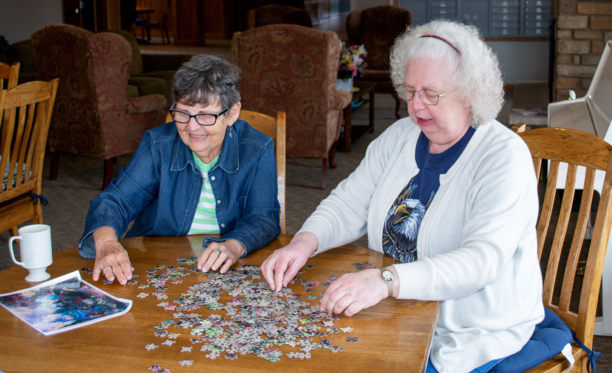 The Estates at Moorhead – residents doing puzzles